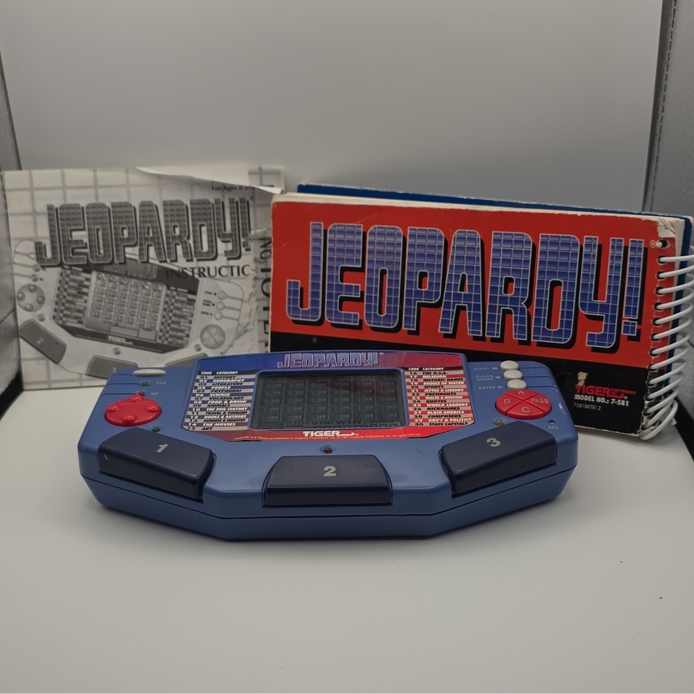 Tiger Jeopardy! Handheld Electronic Game Model 7-581 w/ Cartridge & Manual 1997